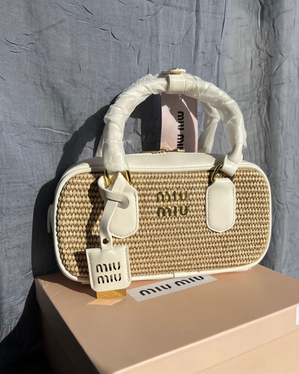 Straw Woven Leather Baguette Charm Handbag