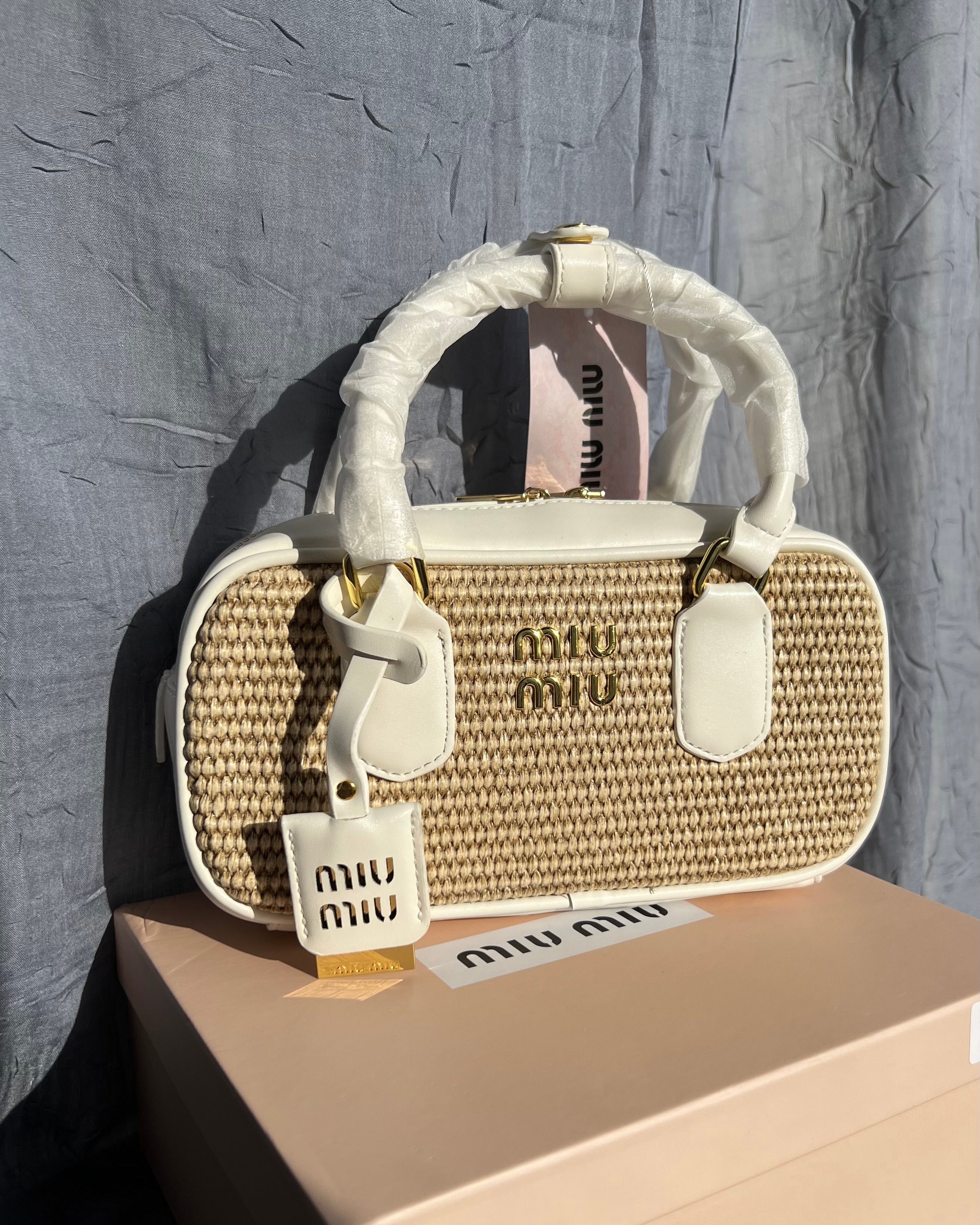 Straw Woven Leather Baguette Charm Handbag