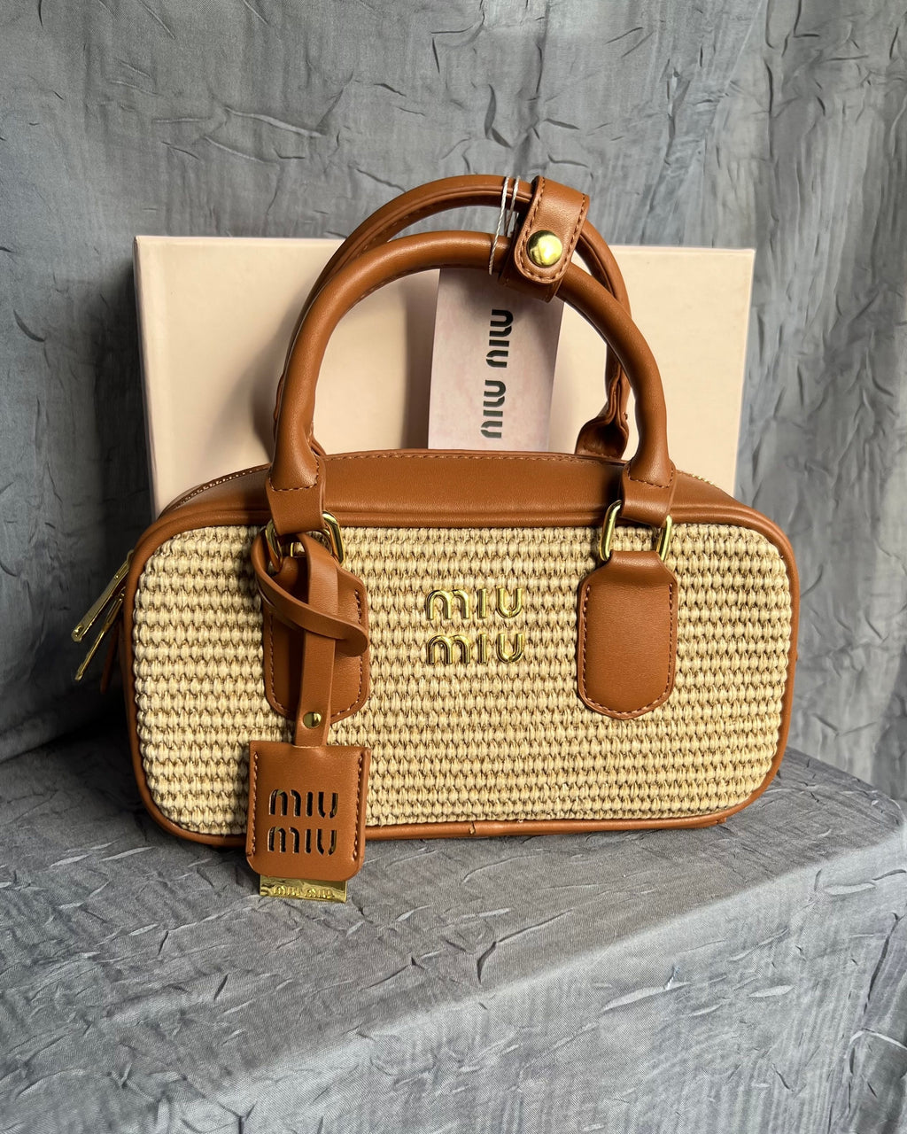 Straw Woven Leather Baguette Charm Handbag
